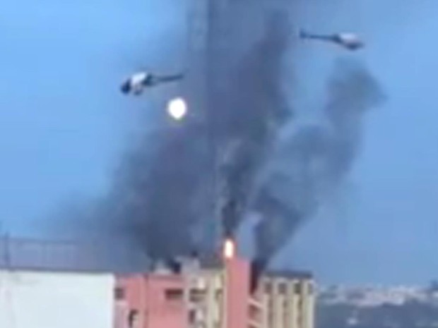 PM usa helicóptero e joga bomba em ação de desocupação no hotel Torre Palace, em Brasília (Foto: Reprodução)